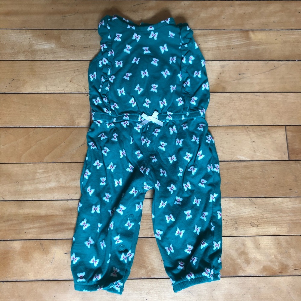 Green romper with butterfly pattern